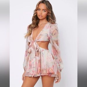 Pink floral romper with open back
